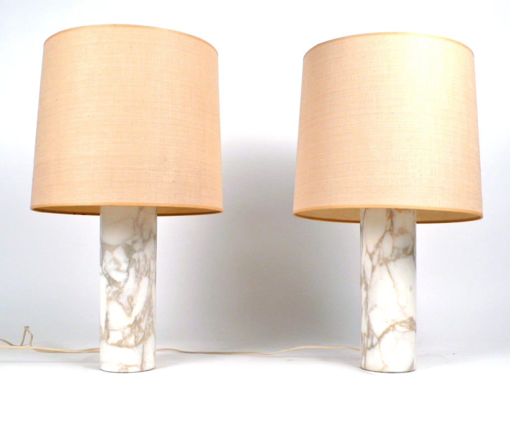 Pair of Solid Calcutta Marble lamps by Nessen Studios. Shades not included.