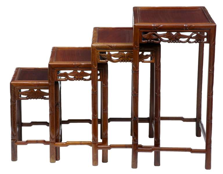Here We Have A Fine Nest Of 4 Chinese Hardwood Tables. Good Colour, With Carved Pierced Frieze And Detail Down The Leg. 

Measurements Of Largest And Smallest Table.