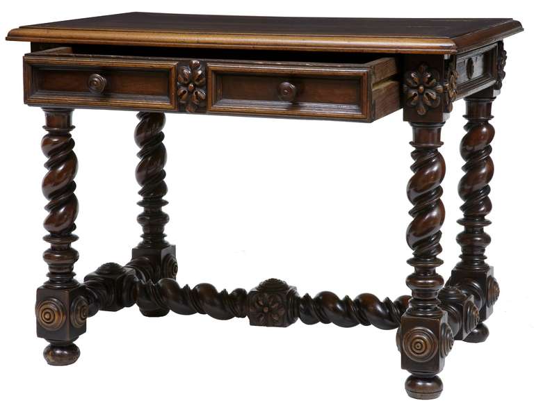 Stunning 18th century French single drawer side table, which could be used for a small desk.

Carved and turned united by stretcher in the same keeping.