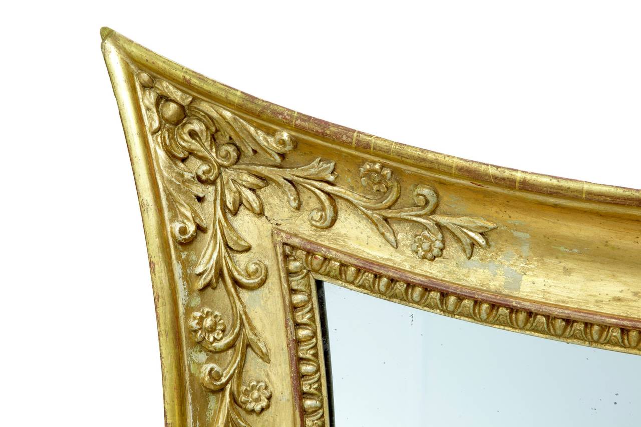 Good quality gilt mirror with adjustable sconce circa 1860.

LOSSES TO GILT AND MINOR LOSSES TO EDGING, IN ORIGINAL CONDITION.

HEIGHT: 33 1/2
