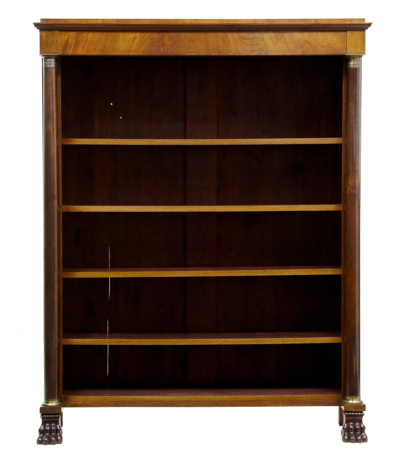 Good quality bookcase, circa 1890. 

Good colour. 4 shelves. Adorned with original brass mounts each end of the columns. Standing on claw feet.

HEIGHT: 62