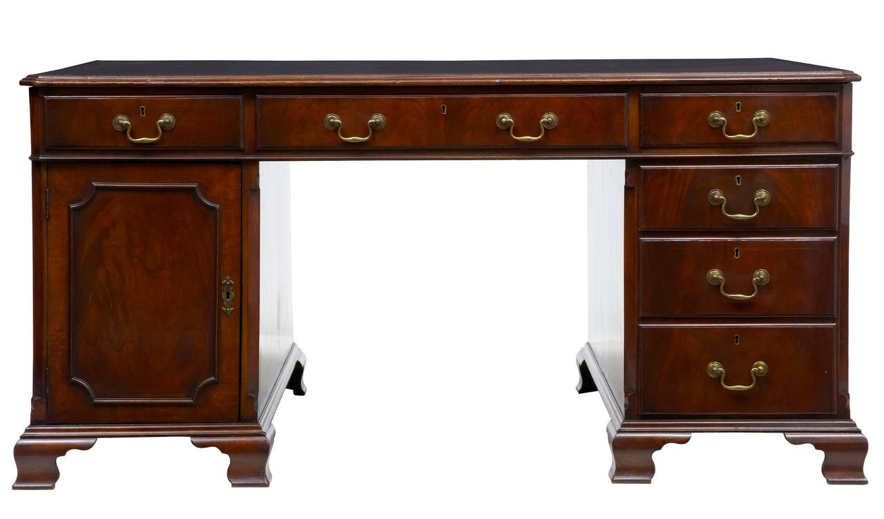 Freestanding partners desk circa 1810. 

Pedestal desk comprising of 3 parts. 

Desk comprises of 3 drawers over a bank of 3 drawers in one pedestal and a cupboard with shelf on the other. Same on the reverse making this a partners desk.