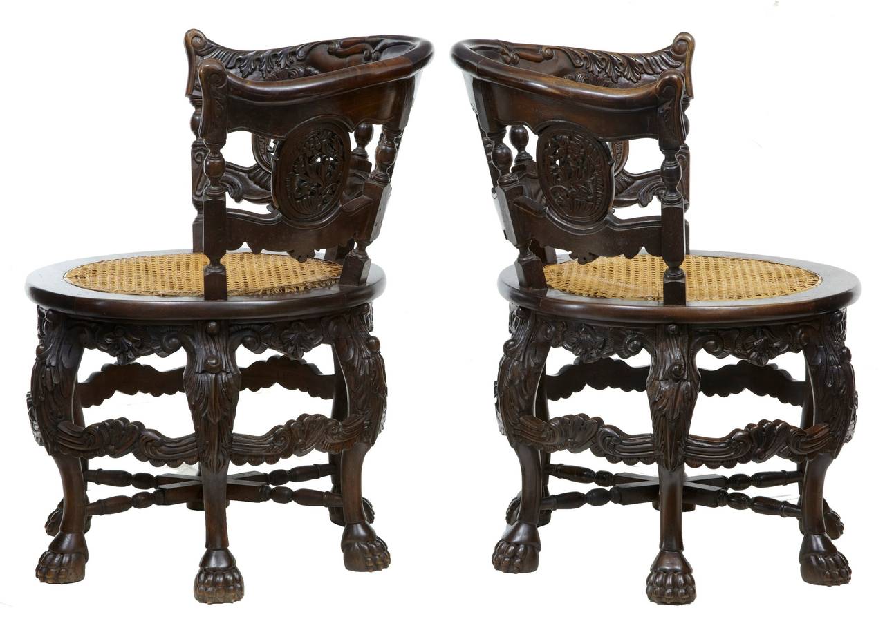Pair of Burmese Carved Hardwood Round Cane Chairs