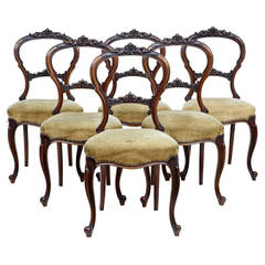 Set of Six Victorian Carved Walnut Balloon-Back Dining Chairs