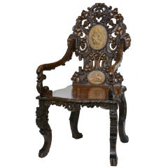 19th Century Carved Inlaid Walnut Black Forest Armchair