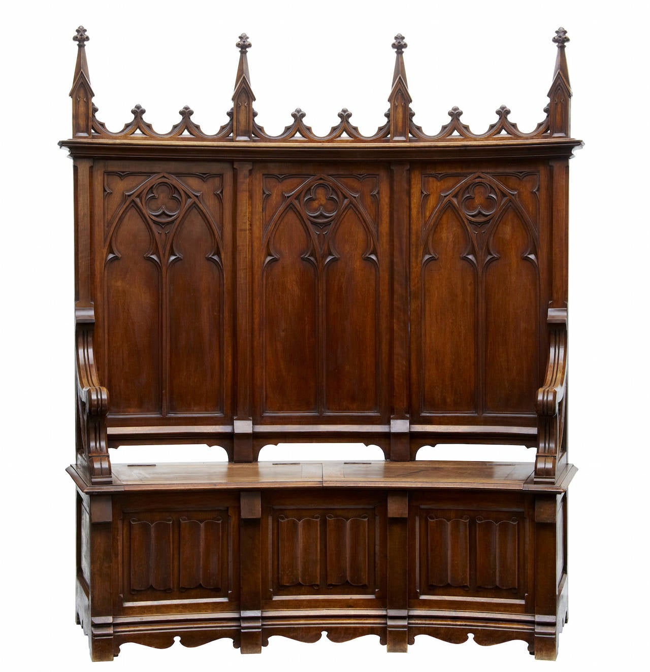 Super quality French walnut settle circa 1880. 

Featuring carved tracery elements to the back and arms. 

2 seats that lift up to expose storage space. 

Rare concave shape

HEIGHT: 67 1/4