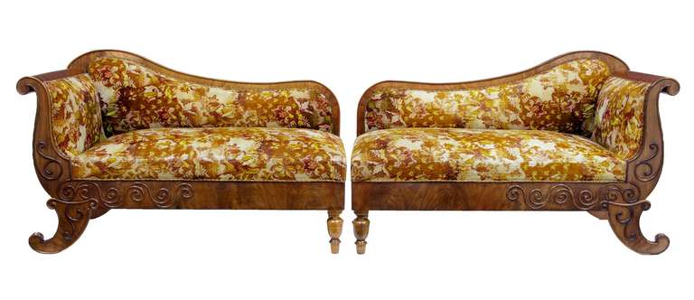 Fine Pair Of Sofas Circa 1860

This Pair Work Well As Seperate Chaises And Were Also Designed In Mind To Adjoin To Form 1 Long Sofa.

Applied Carving Which Runs Down The Arm, Foot And Half Way Across The Front Rail. Scrolled Arm.

Beautiful