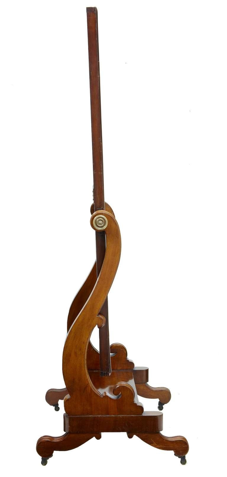 Here we have a tall mahogany cheval mirror in good condition with a quality mirror plate.

Cheval mirrors were so-called because a person could sit on a horse and still view themselves in full regalia. They are easily moved and sculptural in