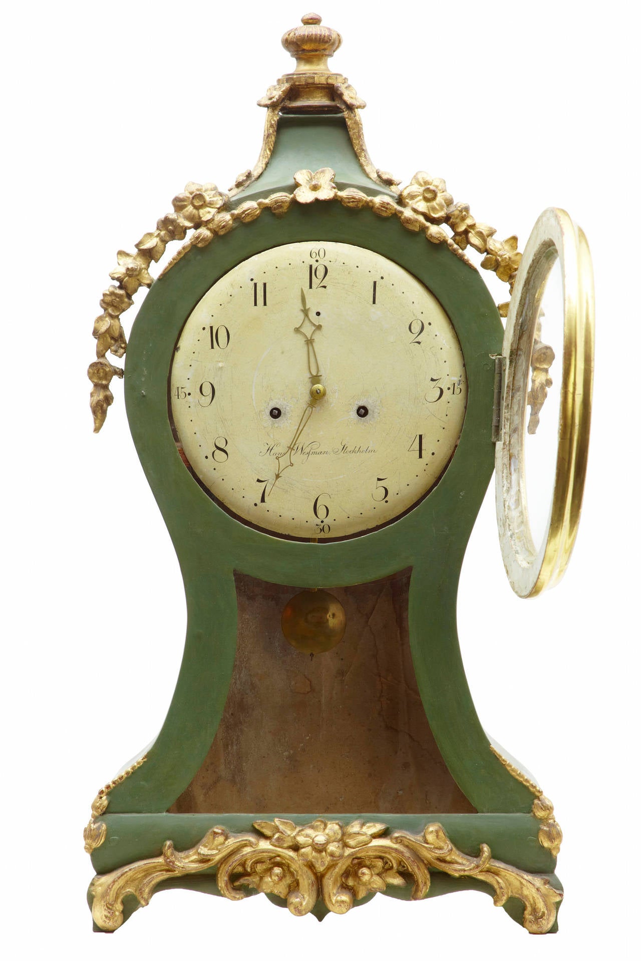 Fine quality Swedish clock in original condition, circa 1790 

Painted green with gilt carved wood decoration. 

Clock face signed Hans Westman, Stockholm 

Will be fully serviced upon sale

Measures: Height: 33