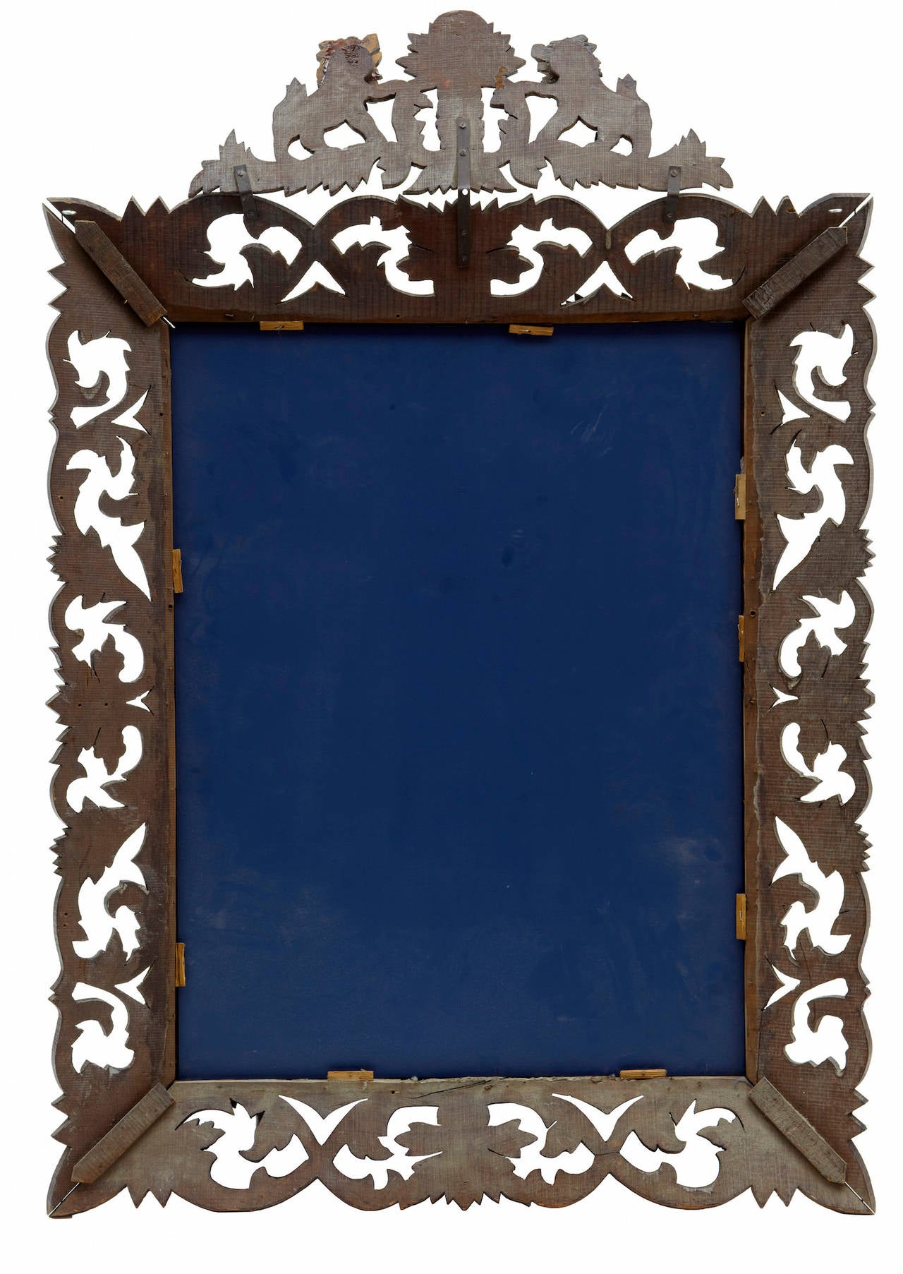 19th century French carved oak mirror.

Finely carved French mirror, circa 1870.

Carved with foliage, surmounted by a pair of lions.

Replaced mirror glass

Measures: Height 53