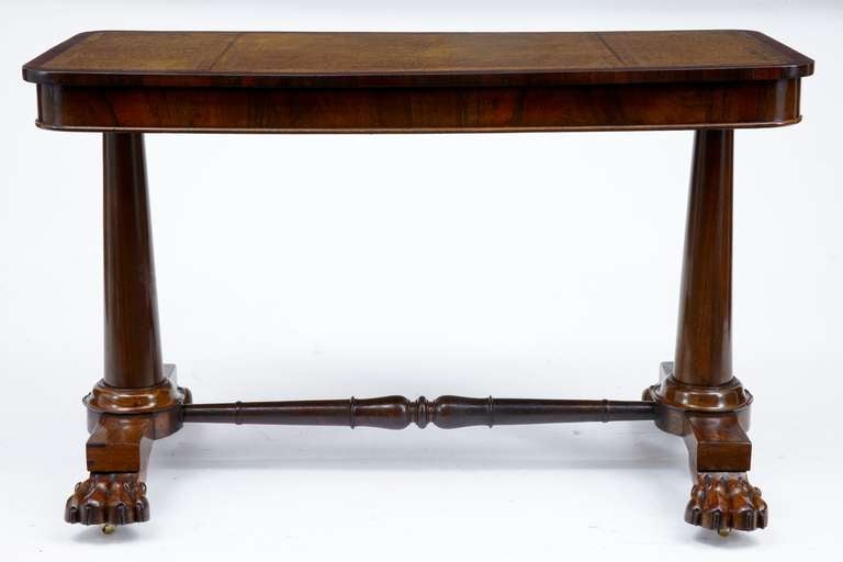 Rosewood Desk With Large Carved Lion Paw Feet With Centre Stretcher. Leather Top With Gold Tooling.