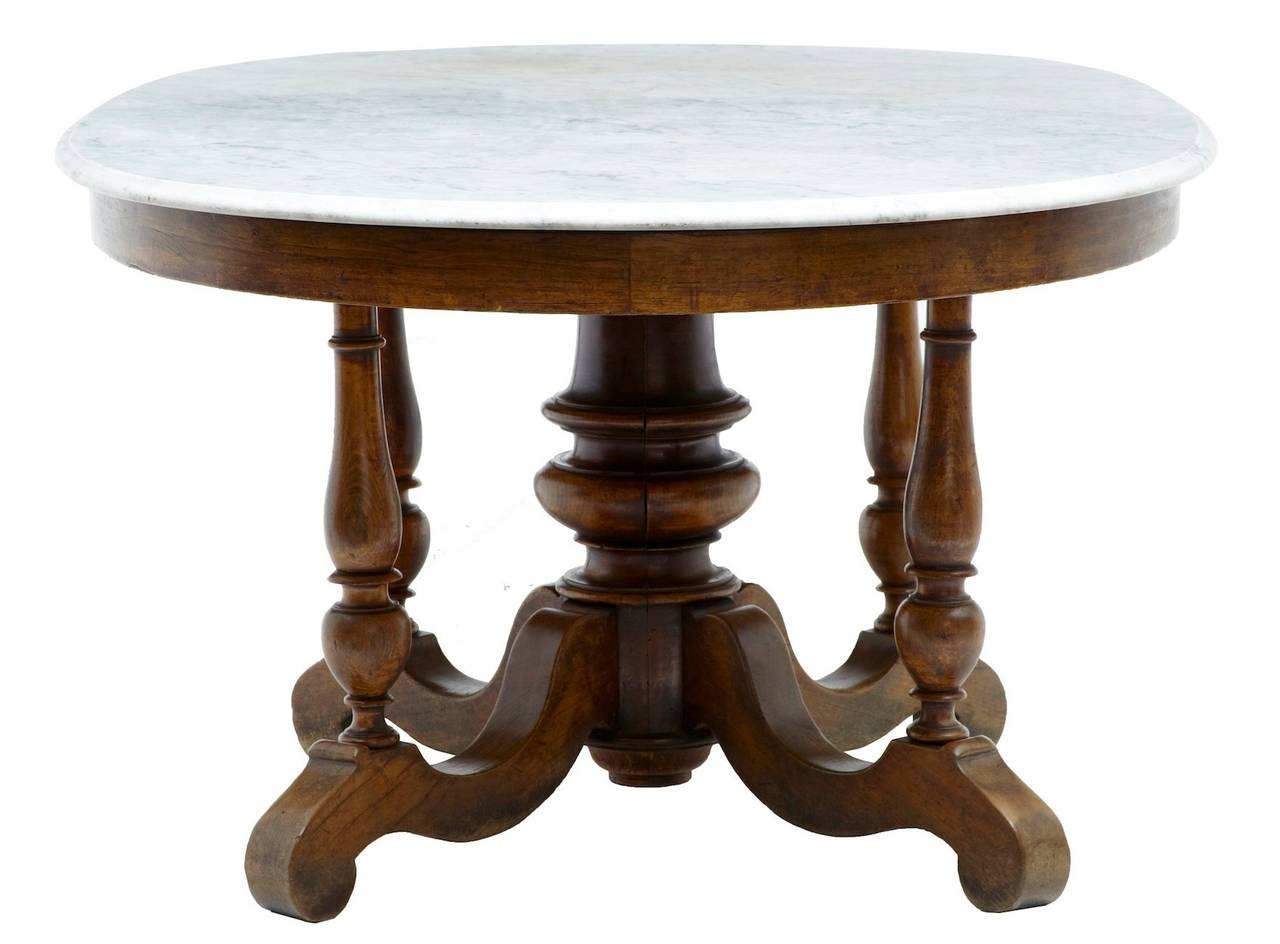 Rare gueridon oval french table circa 1850 

Beautiful original marble top stands on the walnut base standing on central turned column with turned supports and splayed legs

HEIGHT: 29