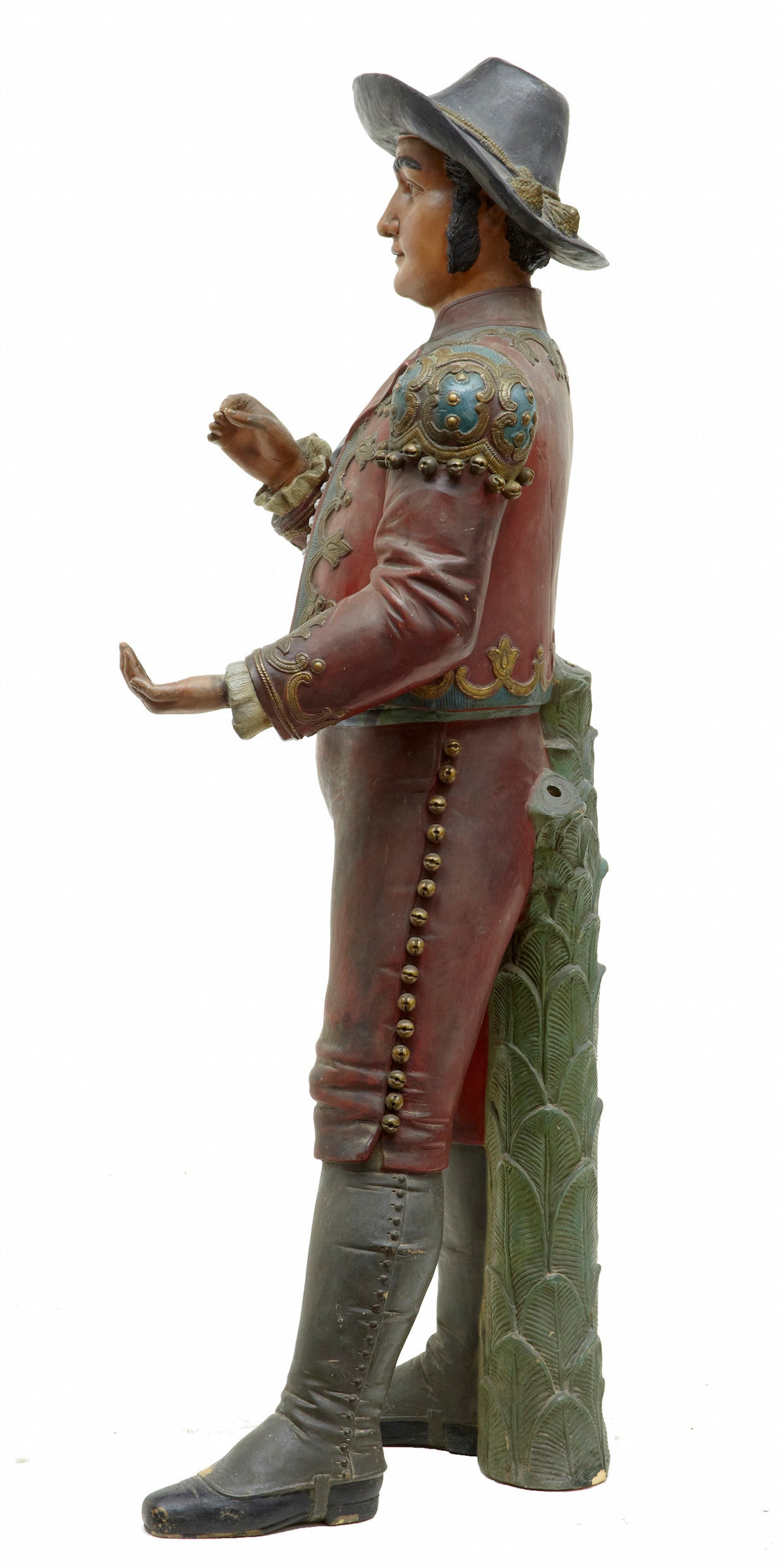 Unusual 19th century Spanish terracotta planter in the form of a figure

Rare and unusual Spanish figure, circa 1890.

Hand-painted and wearing Spanish costume. Figure supported by a cast palm tree base with three deep holes, for holding