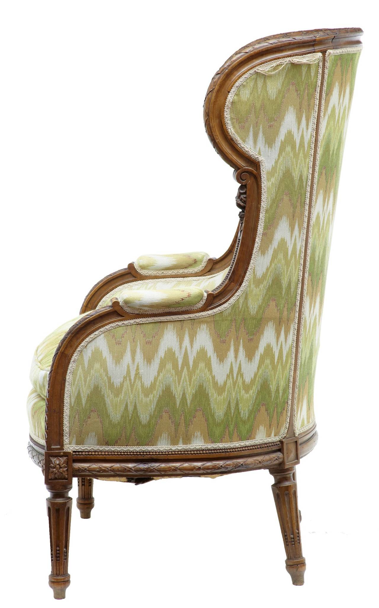 Beautifully carved French walnut armchair, circa 1860. 

Carved all-over the frame, later woven fabric in good order.

Measures: Height: 44 3/4