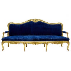 Stunning 19th Century French Carved Gilt Suite of Sofa, Armchairs, and Chairs Stunning 19th Century French Carved Gilt Suite of Sofa, Armchairs, and Chairs