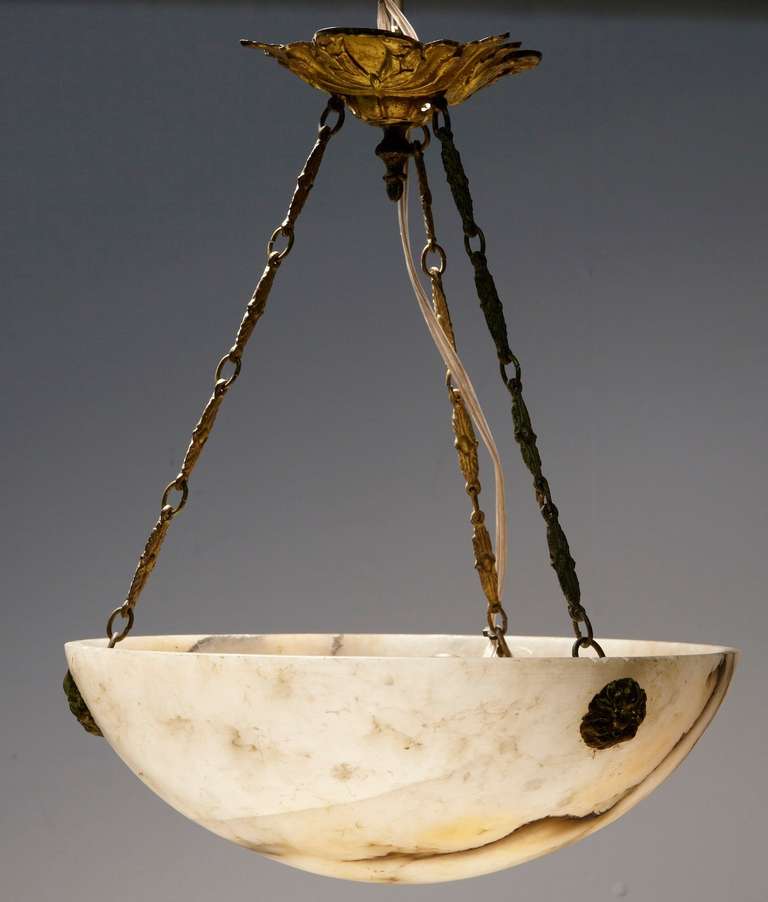 Stunning Art Deco Period Alabaster Ceiling Light Circa 1920.

Simple Natural Alabaster Bowl, With 3 Ormolu Chains Which Lead Up To The Ceiling Rose.

Very Minor Light Scuffing

Fitted With Original Light Fittings...

We Recommended In The