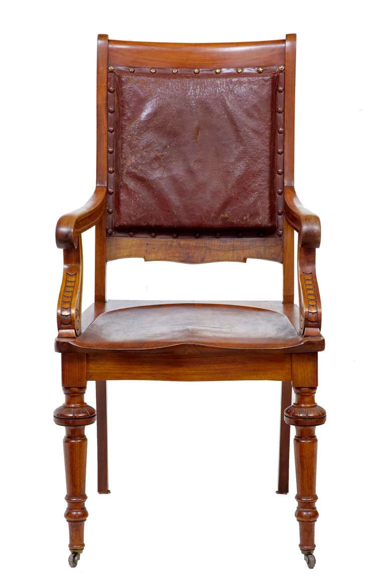 Fine quality Arts & Crafts desk chair, circa 1890.

Carved arms, shaped dished seat and original leather with stud work. Leather although tired is perfectly usable.

Measures: Height 42 1/2