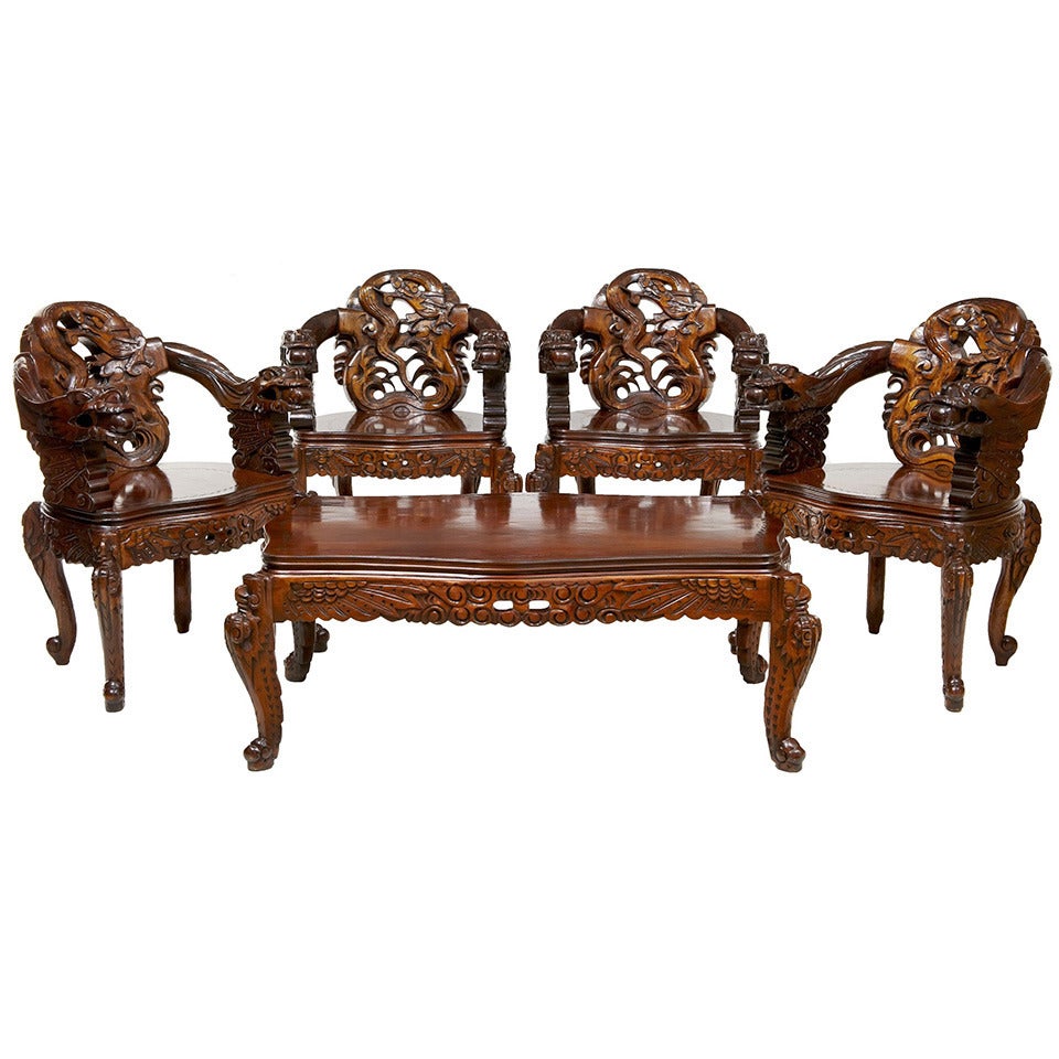 Set of Four Carved Chinese Armchairs with Matching Coffee Table