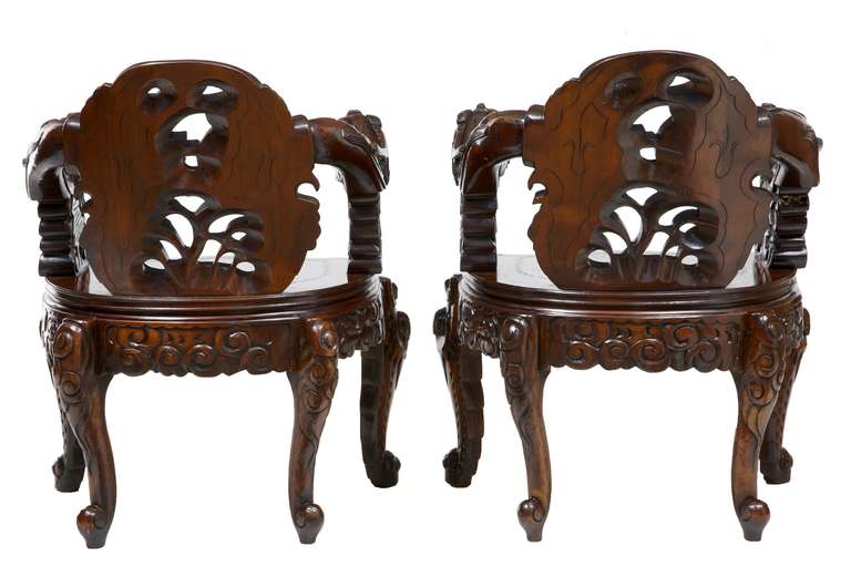Set of Four Carved Chinese Armchairs with Matching Coffee Table In Good Condition In Debenham, Suffolk