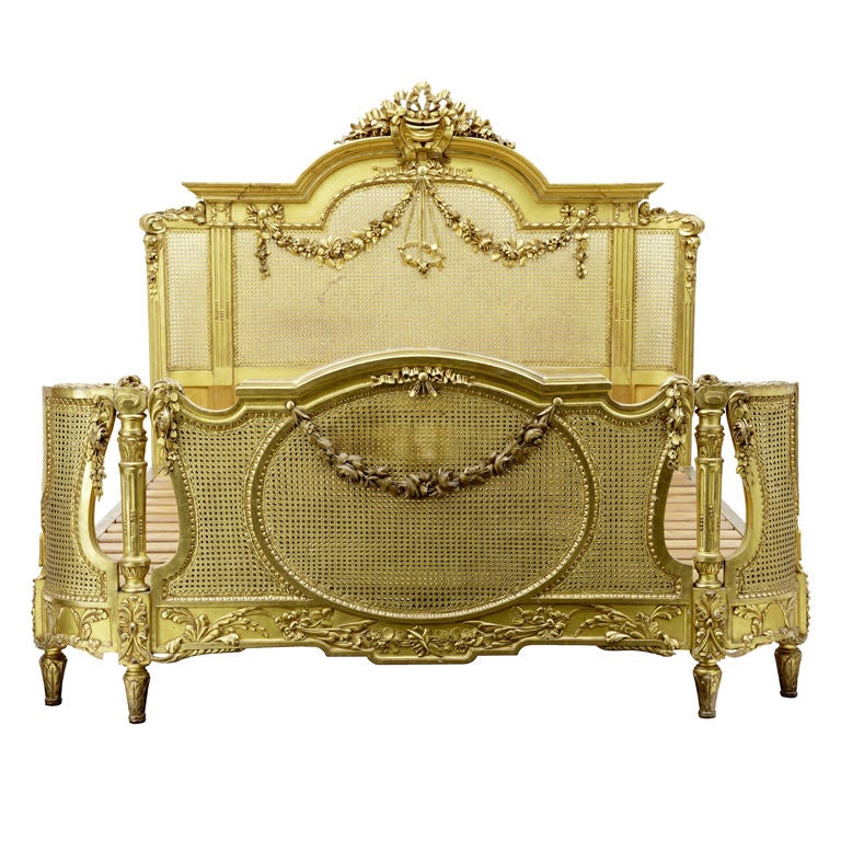 19TH CENTURY CARVED WOOD AND GILT FRENCH KINGSIZE BED
