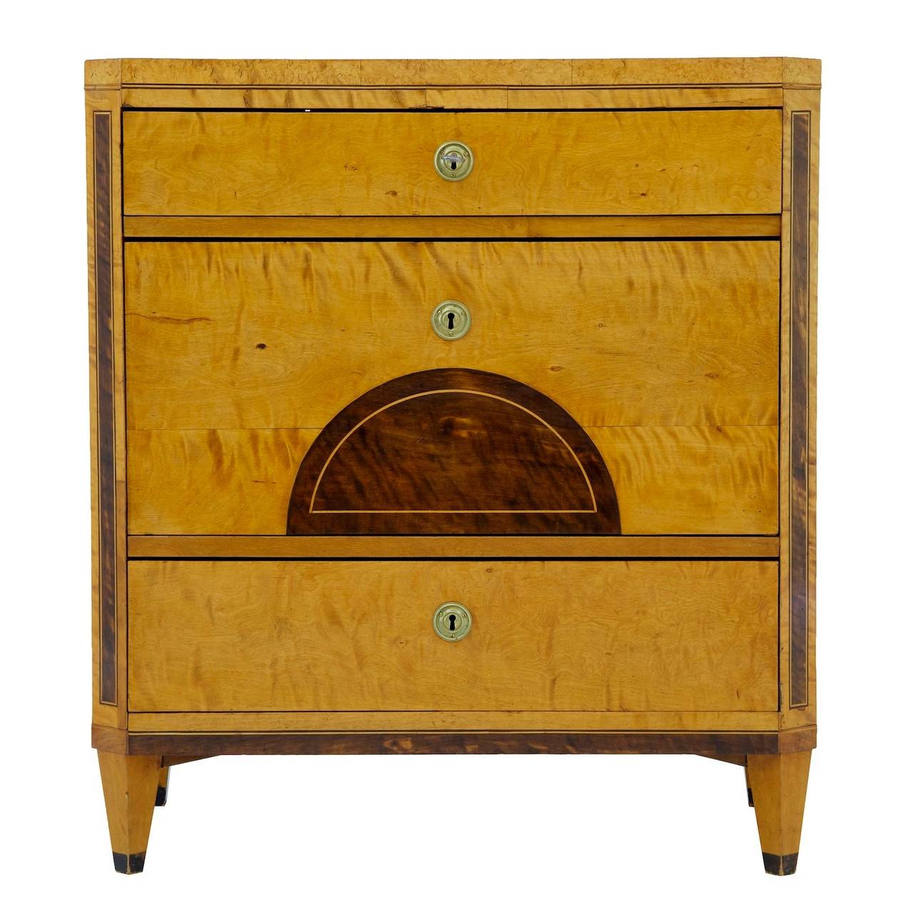 Fine quality chest of drawers, circa 1830. 
Beautiful three-drawer chest, featuring canted corners and karelian birch central half moon and panels. 
Strung to top and front.

Measures: Height: 33 1/4