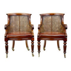 PAIR OF MAHOGANY BERGERE LIBRARY CHAIRS