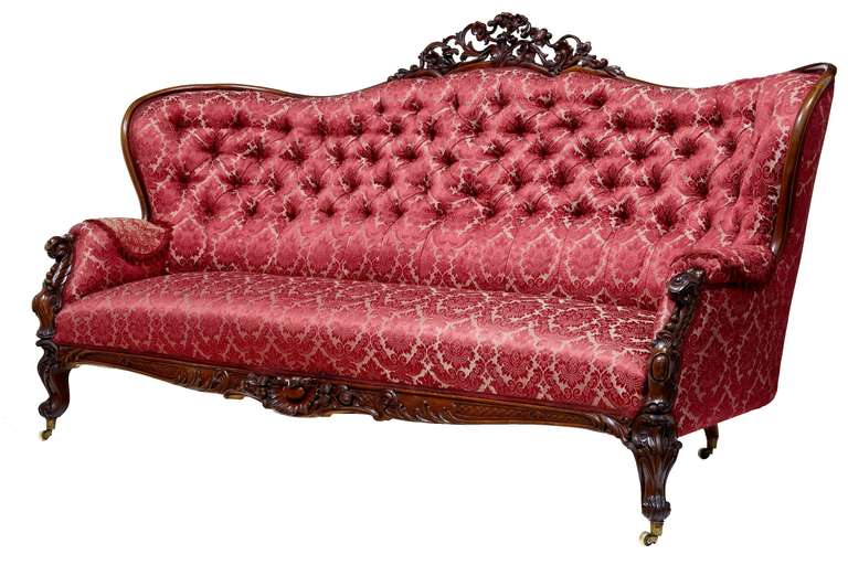 Fine Quality Serpentine Shaped Sofa Circa 1880.

Large In Scale, Serpentine In Shape With Button Back Upholstery. Carved Elements To The Arm, Front Freize And Pierced And Carved On The Back.

Upholstery Is Clean And In Good Order.

Seat