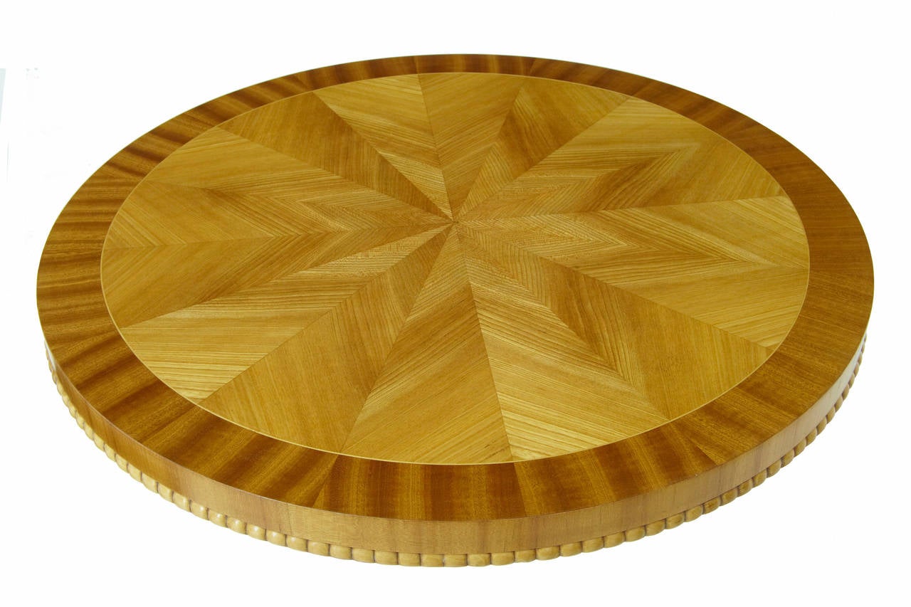 20th century Art Deco birch coffee table
Swedish late Art Deco coffee table, circa 1950.
Elm segmented veneered centre, with birch stringing and outer mahogany ring, standing on birch legs.

Measures: Height 23 1/2