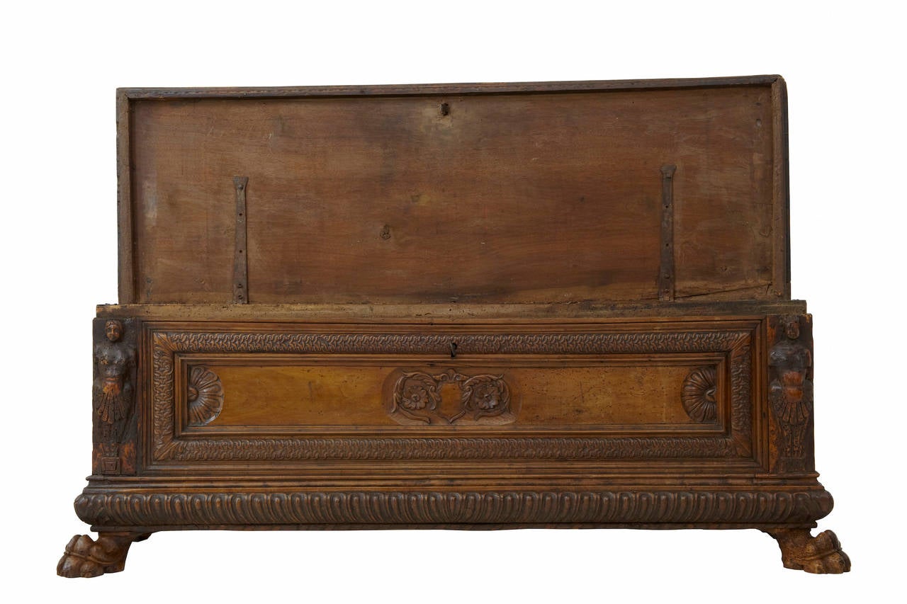 Fine quality Italian walnut cassone, circa 1660.
Rectangular top with ventilated trim, central blank cartouche. Carved figures flank either side, these could quite possibly be the husband and wife as cassone's were often given as a marital