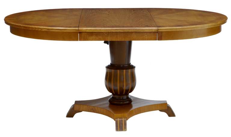 Segmented veneer birch with inlay adjustable center table cum coffee table, circa 1930s.<br />
<br />
Useful table with multiple uses it forms four different sizes of table. In the lower position it forms either a round or oval coffee table. In the