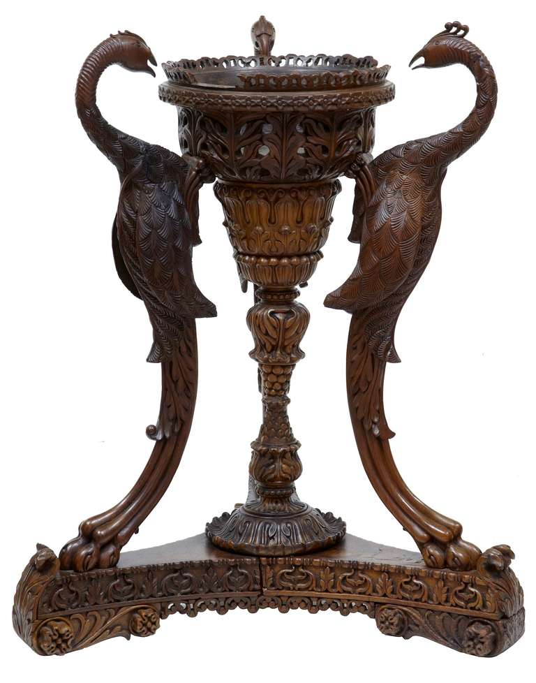 Stunning And Rare Anglo Indian Jardiniere Stand Circa 1880.

Featuring 3 Birds Which Forms The Surround. Pierced Carving Round The Bowl And Around The Triform Base.

Carved Central Column, Standing On Sledge Feet.