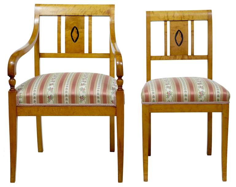 Good quality small dining room set circa 1900. 

Comprises of 4 singles and 2 carver armchairs, good colour. Shell inlay to backs. 

Carver measurements: 

Height: 33 1/2
