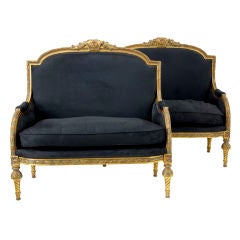 A PAIR OF SMALL 2 SEATER SOFA'S