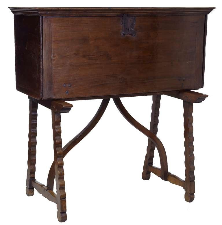 STUNNING AND RARE SPANISH WRITING DESK WITH FITTED INTERIOR 

COMPARATIVELY PLAIN EXTERIOR IS COMPLETELY REVERSED WITH THE FINELY CARVED INTERIOR, FEATURING DRAWERS AND SMALL CUPBOARDS. 

Carvings are offset by silk backgrounds.