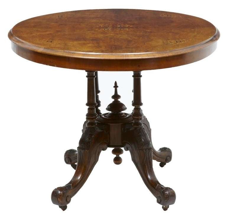 19th century Victorian burr walnut inlaid Loo table

Good quality oval top inlaid loo table, standing on quadriform finely carved base. Quarter veneer top original ceramic castors

Measures: Height 28