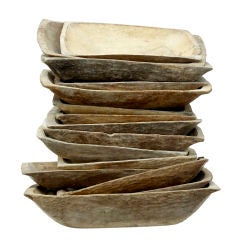 A COLLECTION OF 15 ADZED CARVED RUSTIC WOOD BOWLS