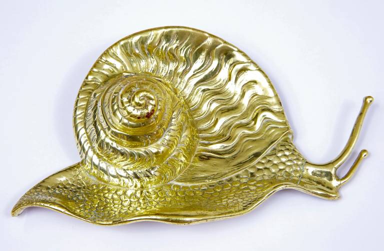 19th century Art Nouveau novelty brass snail ink well

Fine quality novelty ink well.

Measures: Height: 3 1/4