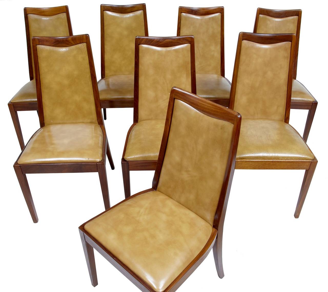 Set of 8 labelled g plan dining chairs circa 1965

Leather seat and back teak dining chairs, with shaped backs.

Height: 36 1/4