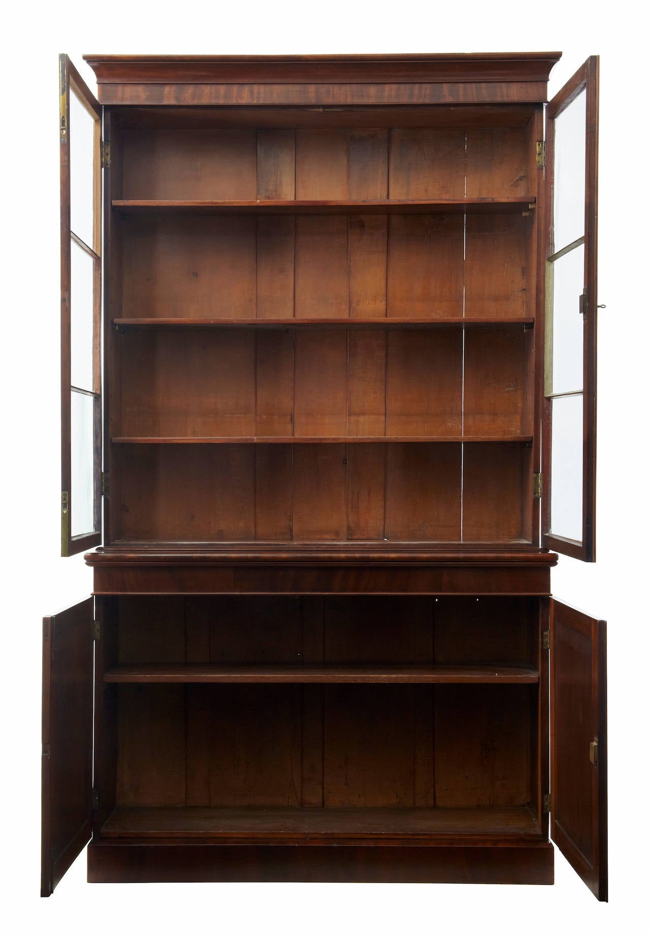 Mahogany glazed bookcase circa 1830.
Comprising of 2 parts.
Top section glazed double doors opens to 3 original adjustable shelves, with lock and key.
Bottom double doors opens to reveal single shelf.
1 replaced pane of glass, later restoration