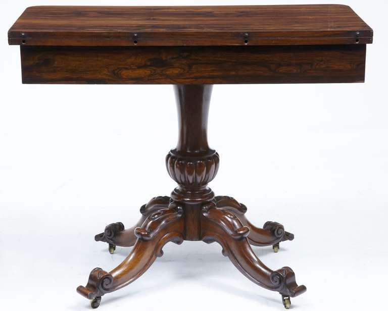 Stunning Figuring And Colour On This Early Victorian Tea Table. 

Four Legs Standing On Brass Castors.