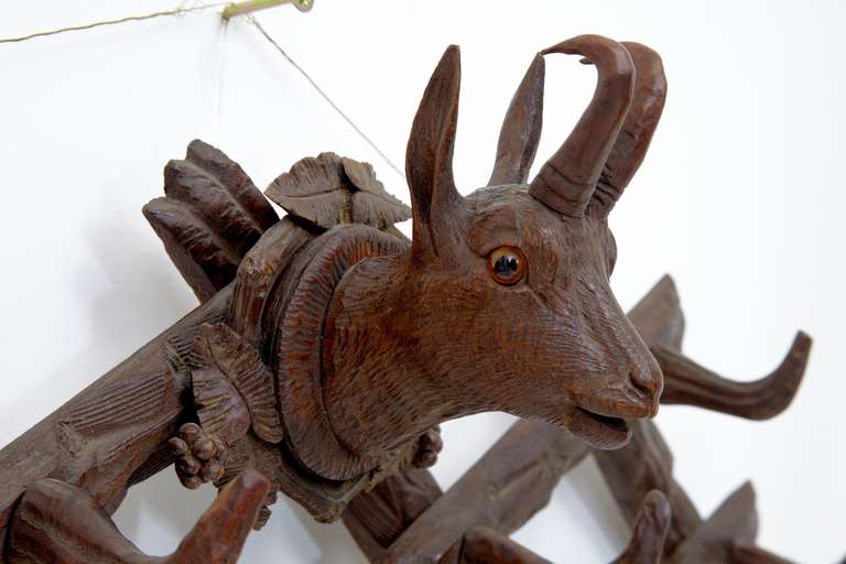 Black forest deer head carved coat hooks, circa 1880
Nice rack for coats, beautifully carved.