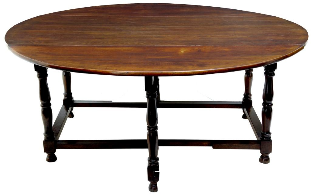 19TH CENTURY OAK ENGLISH GATELEG TABLE SEATS 12
