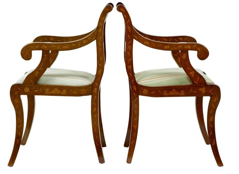 Pair of 19th century, Dutch walnut marquetry armchairs

Fine quality pair of walnut inlaid armchairs, circa 1830.

inlay to back, arms, front rail and legs. Salt and pepper inlay on the arms and legs, floral marquetry.

Measures: Height: 34