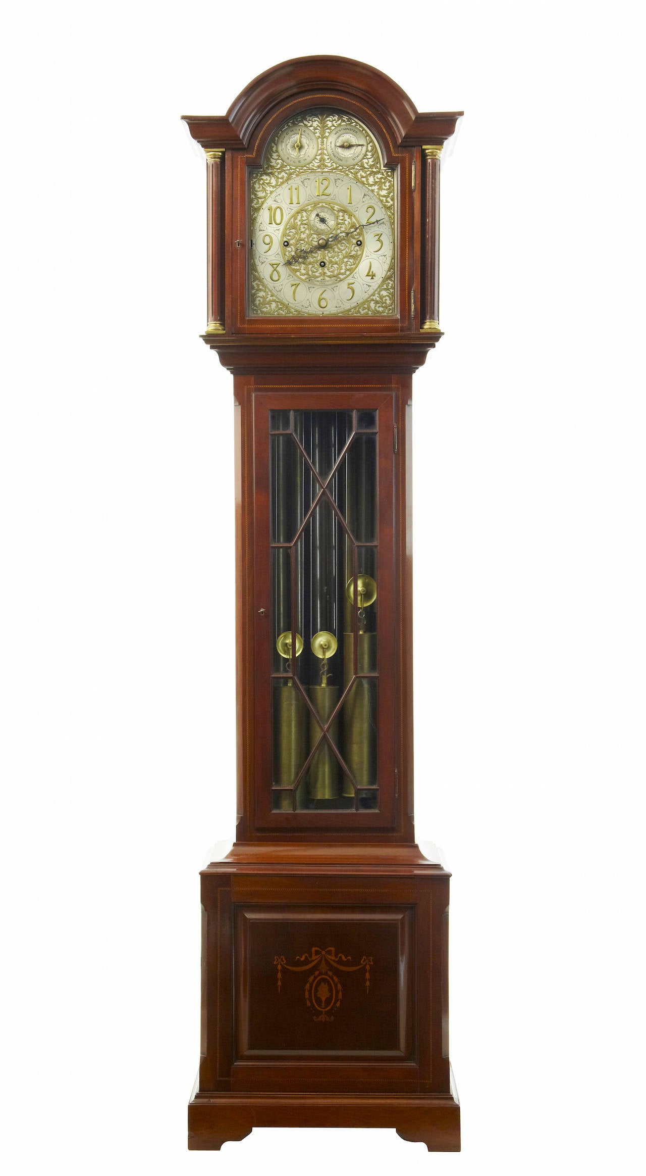 Longcase clock circa 1895.Retailed by kirby beard and co ltd paris, stamped on face.Fully restored movement.Fretwork to hood sides.9 tubular gongs playing westminster,whittingham and st micheal chimes.Astral glazed door to the front exposes the