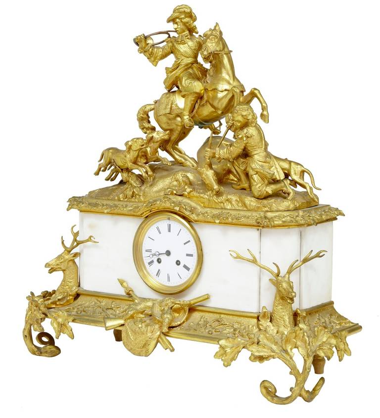 Stunning quality french made clock circa 1870. 

Featuring a master on his horse using a trumpet to round his dogs and a squire tending to the kill. Stag heads to the front legs and a gun and spear crossed with a hare and pigeon under the clock
