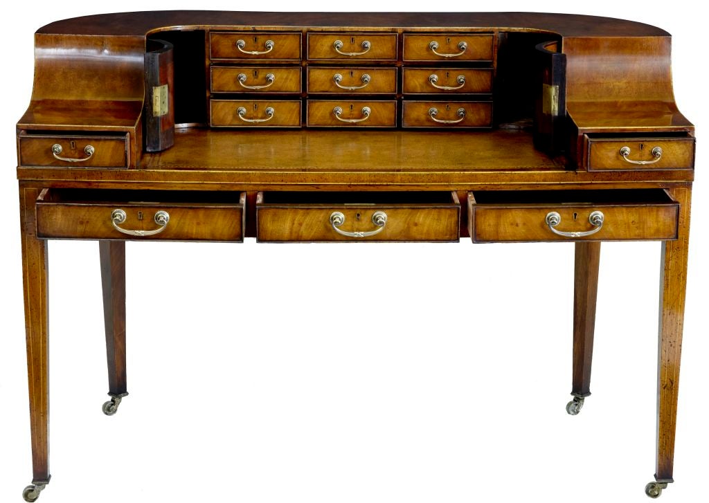 EARLY 20TH CENTURY MAHOGANY CARLTON HOUSE DESK INLAID WITH BOXWOOD AND A PARCHMENT COLOUR WRITING SURFACE, CIRCA 1920