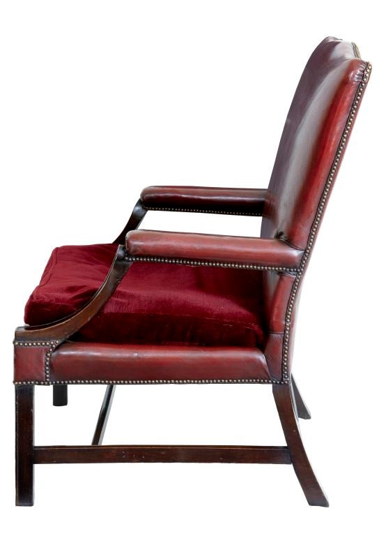 18TH CENTURY GAINSBOROUGH CHAIR CIRCA 1790, UPHOLSTERED IN RED LEATHER WITH RED VELVET CUSHION, FRONT MOULDED LEGS AND ARMS