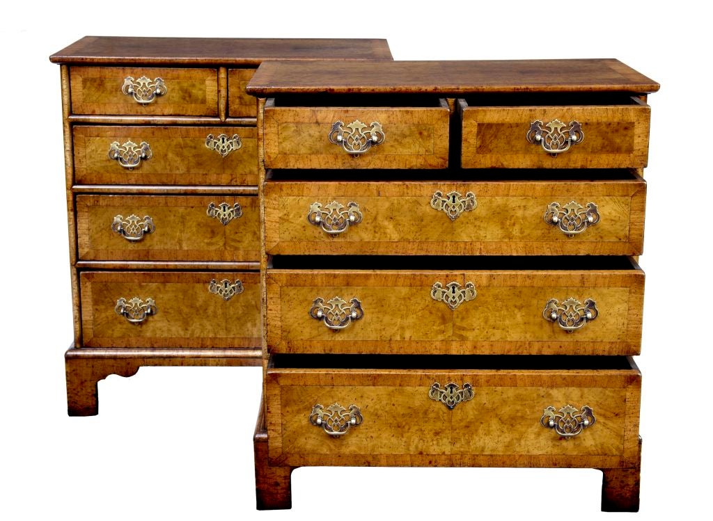 A Pair Of Walnut Chest Of Drawers