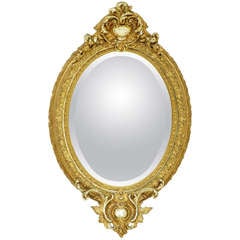 19th Century Carved Burnished Gilt Oval Mirror