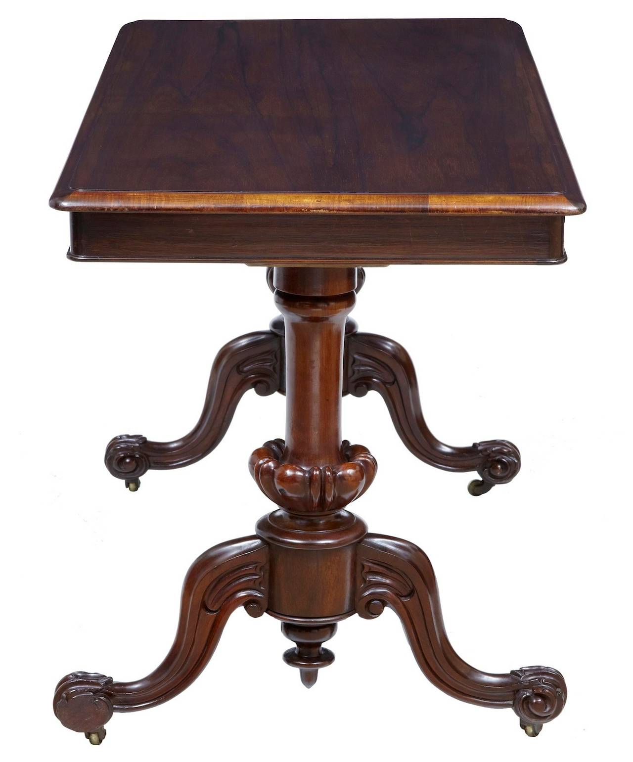 19th century carved rosewood writing table

Early Victorian rosewood writing table, circa 1850.

Good color with the striking rosewood patina.

Turned legs on carved scrolled feet.

One piece of carving missing off foot (photographed) marks